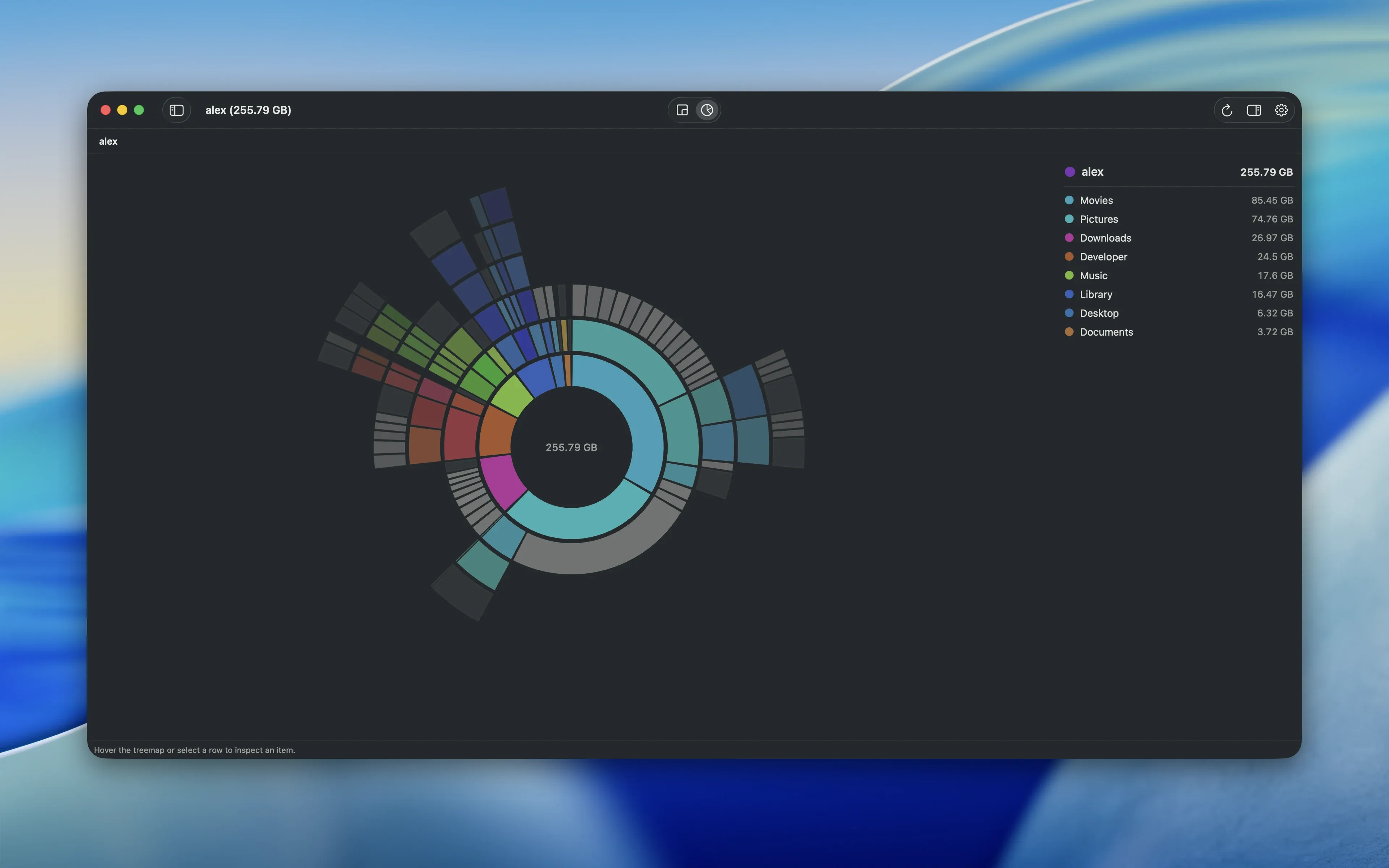 Neodisk disk-usage interface with a sunburst visualization and folder details.